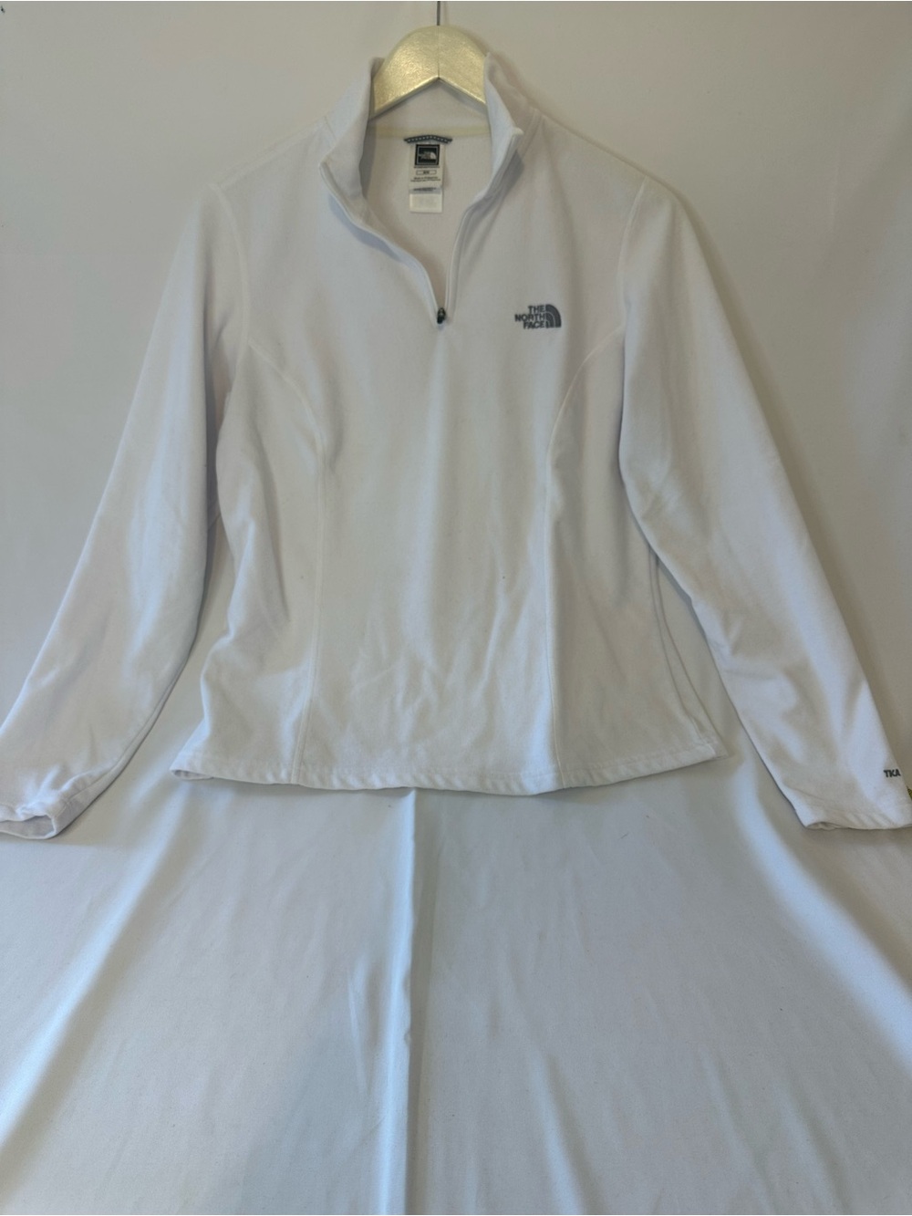 The North Face Women’s White Quarter-Zip white fleece pullover
